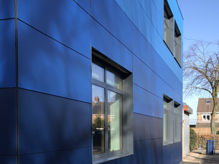 Why Cladding Spray Painting Contractors Are the Smart Choice for Commercial Building Refurbishment